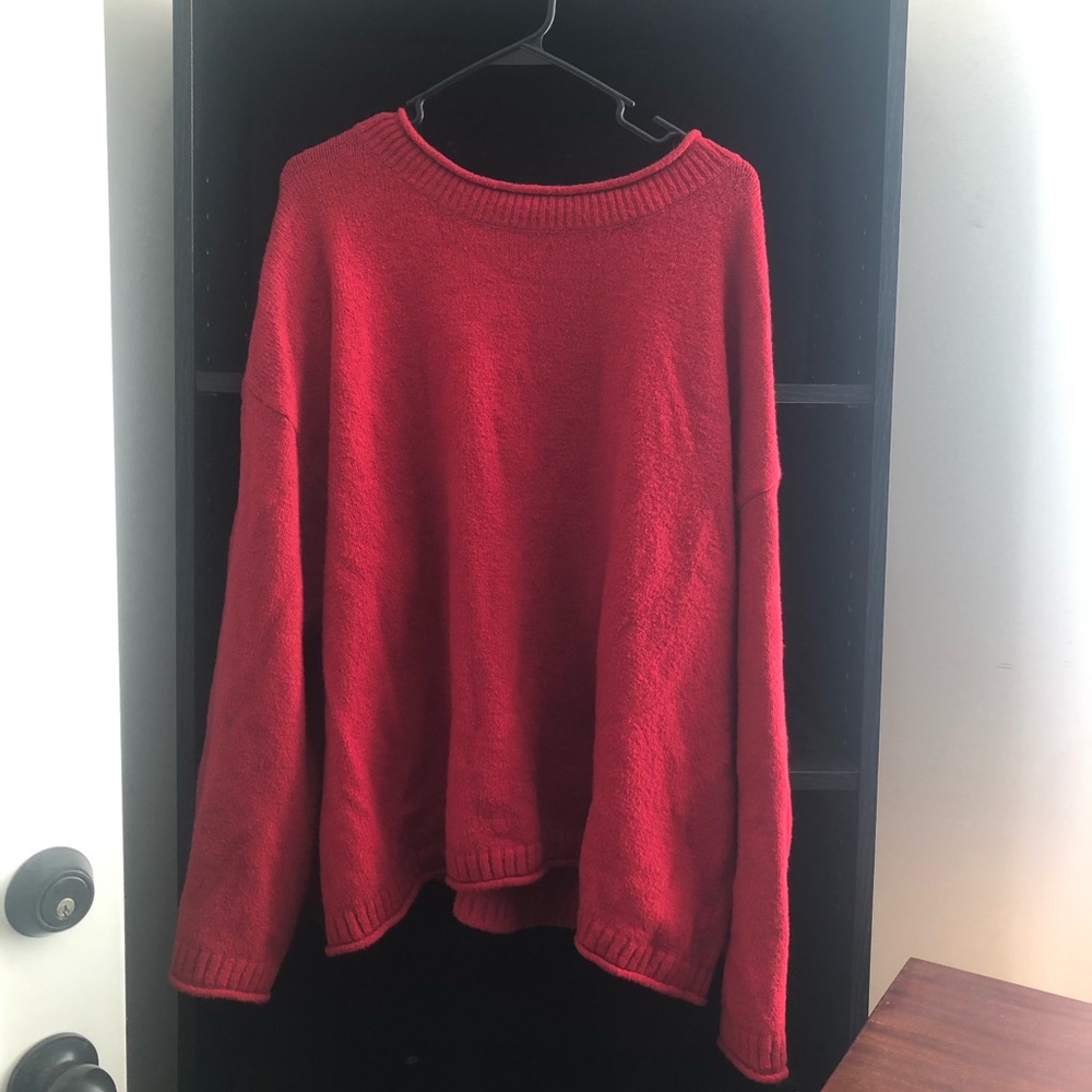 Red sweater with cut out sleeves